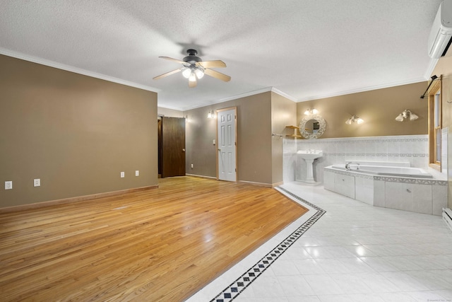 9 Philip Ln, Ledyard, CT 06339 - entrance foyer featuring a ceiling fan, an AC wall unit, ornamental molding, a textured ceiling, and tile patterned floors