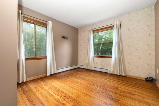 9 Philip Ln, Ledyard, CT 06339 - empty room featuring light wood-style flooring and wallpapered walls