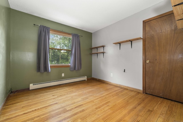 9 Philip Ln, Ledyard, CT 06339 - unfurnished room featuring a baseboard radiator and light wood-type flooring