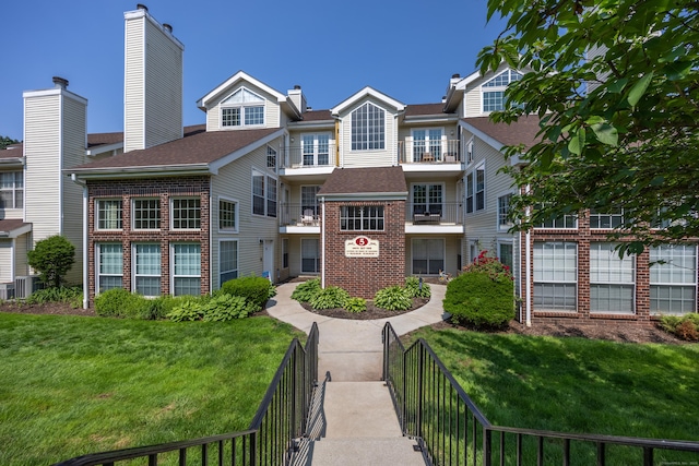 136 Carriage Crossing Ln Unit 136, Middletown, CT 06457 - view of front facade featuring brick siding