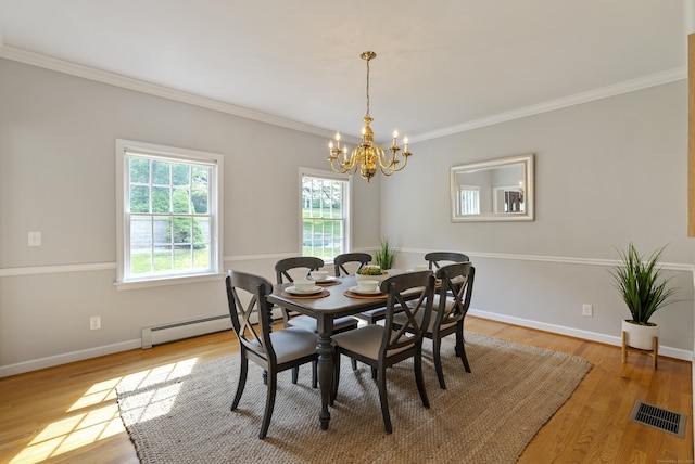 109 Andrew Dr, Canton, CT 06019 - dining room with baseboard heating, a chandelier, crown molding, and wood finished floors