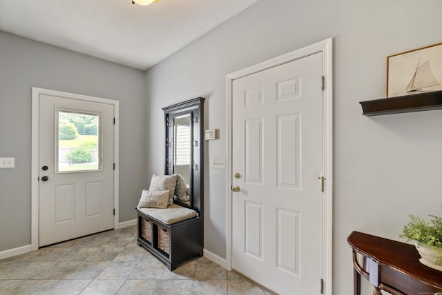109 Andrew Dr, Canton, CT 06019 - entryway with baseboards and light tile patterned floors