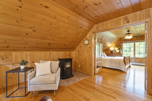 109 Andrew Dr, Canton, CT 06019 - bedroom featuring wood ceiling, a wood stove, lofted ceiling, wood walls, and wood finished floors