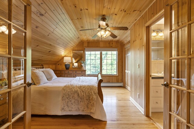 109 Andrew Dr, Canton, CT 06019 - bedroom with baseboard heating, lofted ceiling, light wood-style floors, wooden ceiling, and wooden walls