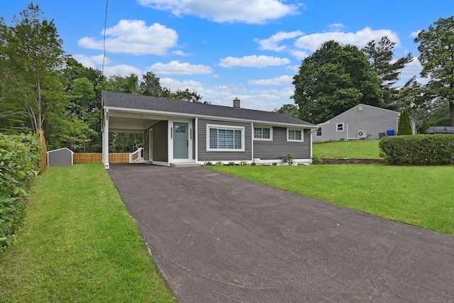 10 Yale Dr, Enfield, CT 06082 - ranch-style home featuring a chimney, driveway, and an attached carport