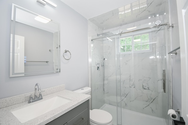 10 Yale Dr, Enfield, CT 06082 - full bathroom featuring toilet, a marble finish shower, and vanity