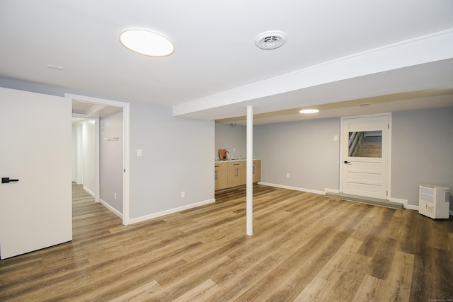 10 Yale Dr, Enfield, CT 06082 - finished below grade area with light wood-type flooring and baseboards