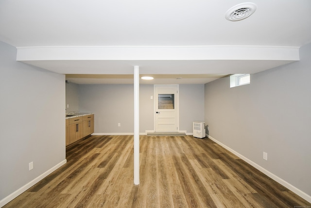 10 Yale Dr, Enfield, CT 06082 - below grade area featuring wood finished floors and baseboards