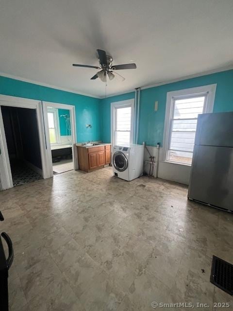 201 Lewis St, Bridgeport, CT 06605 - laundry area featuring cabinet space and a ceiling fan