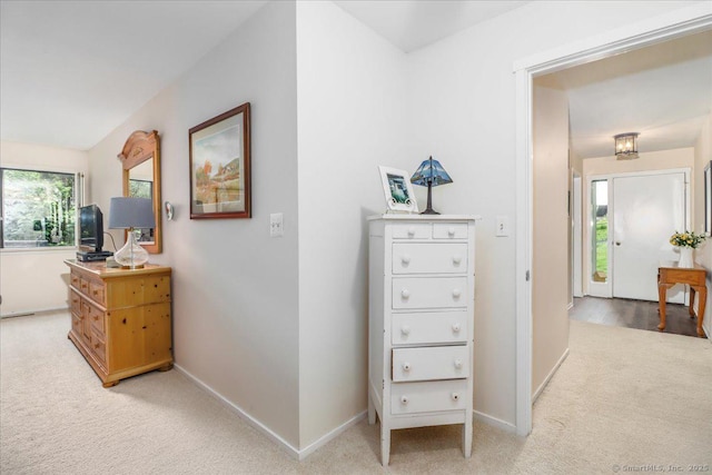 192 Heritage Vlg Unit A, Southbury, CT 06488 - hallway featuring light colored carpet and baseboards