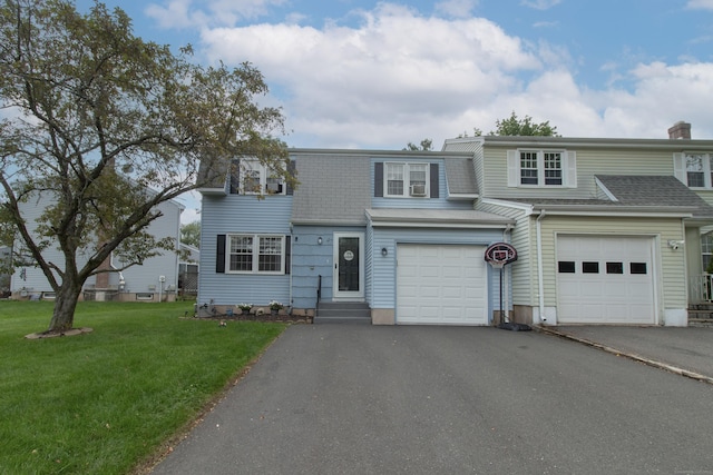 47 Pebble Dr, Newington, CT 06111 - multi unit property with asphalt driveway, a front yard, an attached garage, and roof with shingles