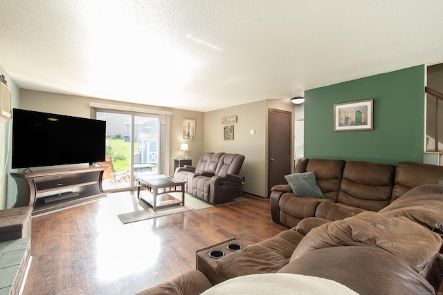 47 Pebble Dr, Newington, CT 06111 - living area with wood finished floors and a textured ceiling