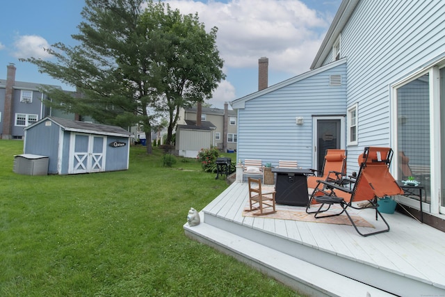 47 Pebble Dr, Newington, CT 06111 - wooden terrace featuring a storage shed and a yard
