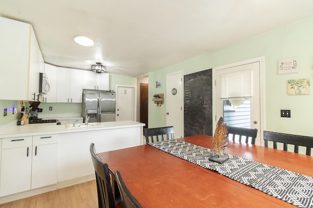 47 Pebble Dr, Newington, CT 06111 - dining room featuring light wood finished floors
