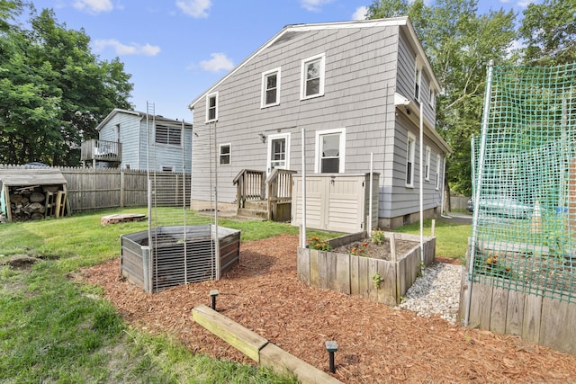 3 Price Ct, East Hartford, CT 06108 - back of house with a garden and central air condition unit