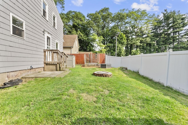 3 Price Ct, East Hartford, CT 06108 - view of yard with an outdoor fire pit and central AC unit