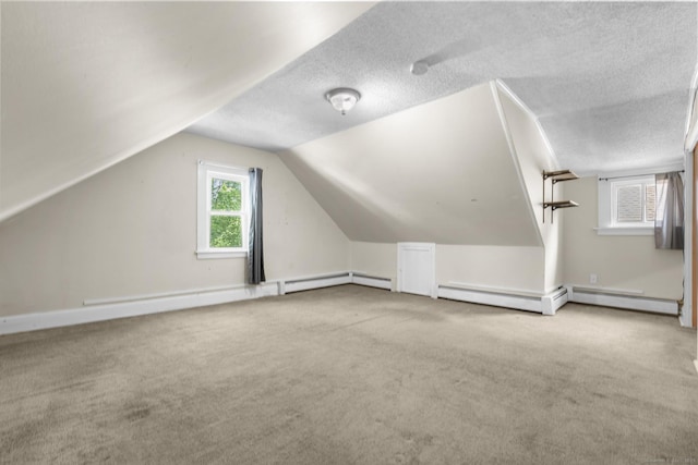 3 Price Ct, East Hartford, CT 06108 - bonus room featuring carpet flooring, vaulted ceiling, and a textured ceiling