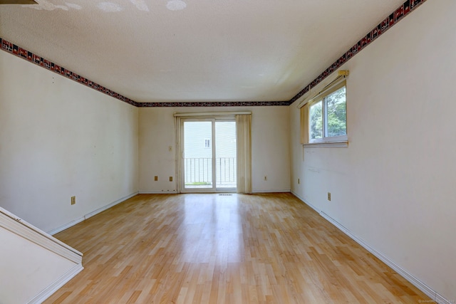 269 Captain Thomas Blvd Unit 12, West Haven, CT 06516 - unfurnished room with light wood finished floors and baseboards