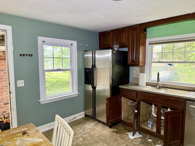 37 Thorpe Ave, Meriden, CT 06450 - kitchen featuring appliances with stainless steel finishes, light countertops, healthy amount of natural light, and a sink