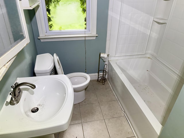 37 Thorpe Ave, Meriden, CT 06450 - bathroom with toilet, a sink, tile patterned floors, baseboards, and bathtub / shower combination