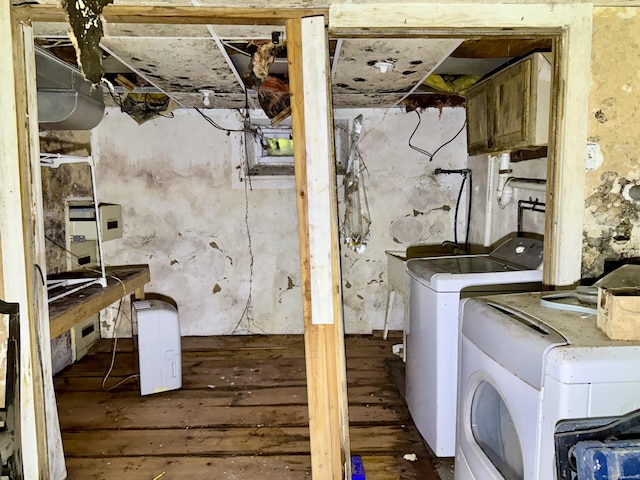 37 Thorpe Ave, Meriden, CT 06450 - unfinished basement featuring washing machine and dryer and wood finished floors
