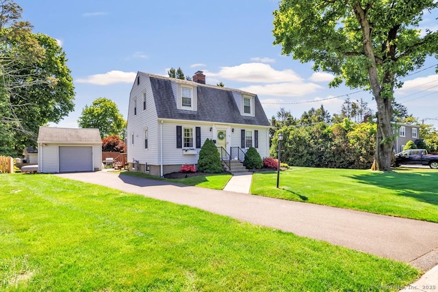 40 Cutspring Rd, Stratford, CT 06614 - colonial inspired home featuring an outbuilding, a gambrel roof, a chimney, a shingled roof, and a garage