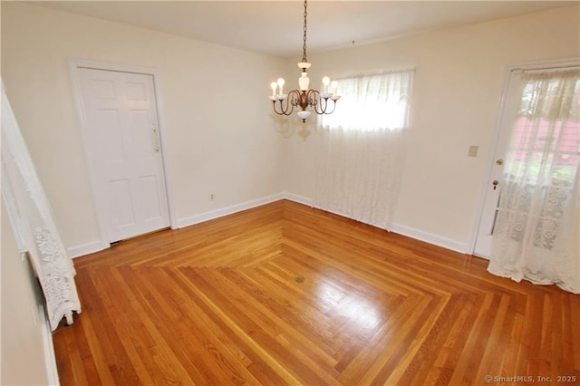 159 Hemlock Rd, New Haven, CT 06515 - unfurnished room with a chandelier and baseboards