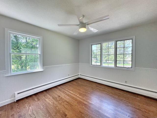 17 Currituck Rd, Newtown, CT 06470 - unfurnished room featuring a wainscoted wall, wood finished floors, ceiling fan, and a textured ceiling