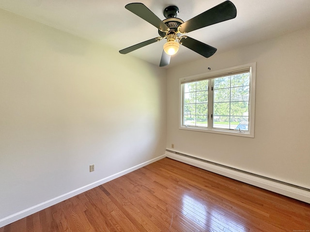 17 Currituck Rd, Newtown, CT 06470 - unfurnished room featuring baseboard heating, wood finished floors, baseboards, and a ceiling fan