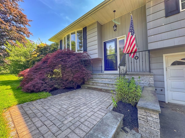 17 Currituck Rd, Newtown, CT 06470 - entrance to property featuring covered porch and a garage