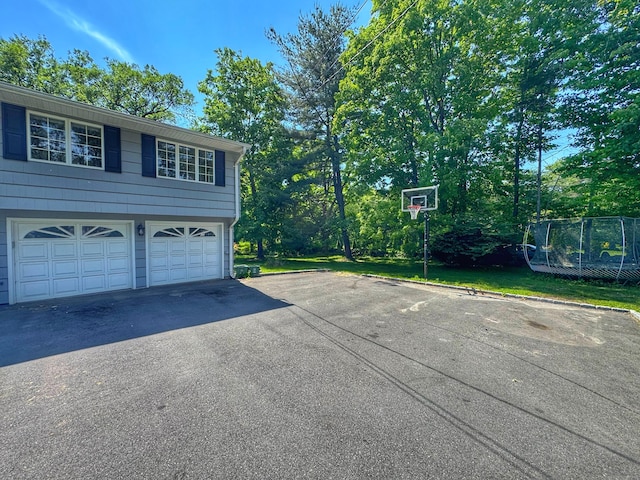 17 Currituck Rd, Newtown, CT 06470 - view of home's exterior featuring asphalt driveway
