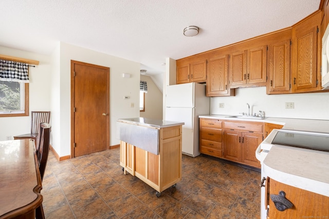 30 Sheila Ct Apt 31, Bristol, CT 06010 - kitchen with white appliances, a sink, a center island, and light countertops