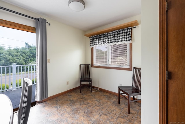 30 Sheila Ct Apt 31, Bristol, CT 06010 - living area with baseboards and stone finish flooring