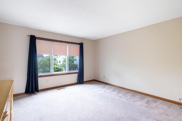 30 Sheila Ct Apt 31, Bristol, CT 06010 - spare room with light carpet and baseboards