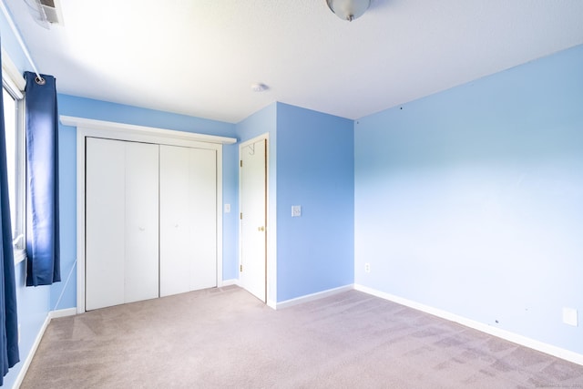 30 Sheila Ct Apt 31, Bristol, CT 06010 - unfurnished bedroom with carpet, baseboards, and a closet