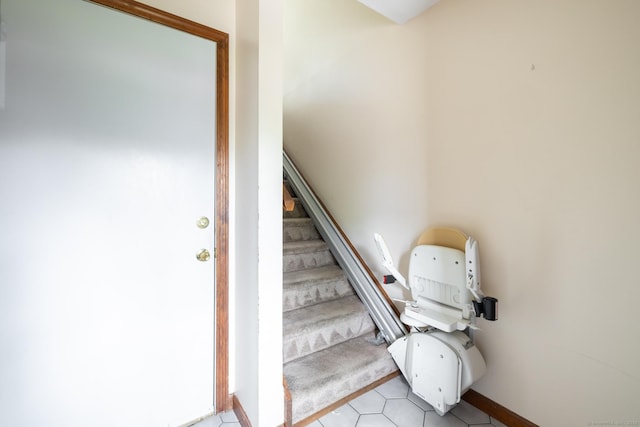 30 Sheila Ct Apt 31, Bristol, CT 06010 - stairs featuring tile patterned flooring and baseboards