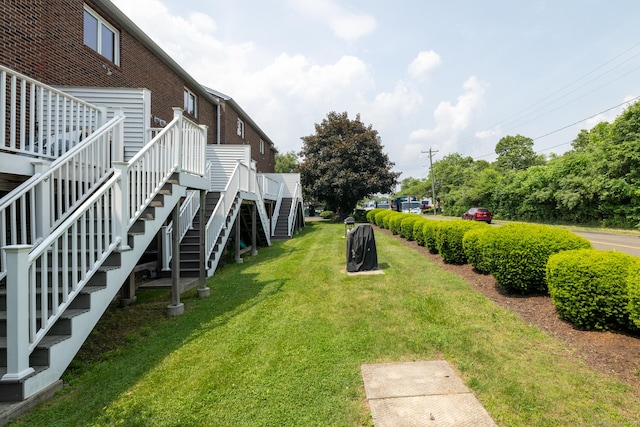 30 Sheila Ct Apt 31, Bristol, CT 06010 - view of green lawn featuring stairway and a deck
