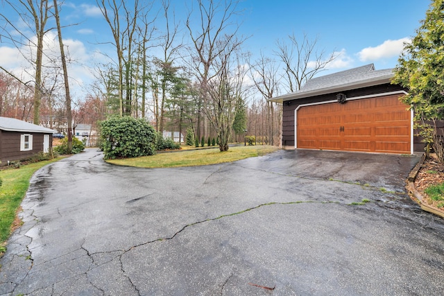 575 W Todd St, Hamden, CT 06518 - garage featuring asphalt driveway