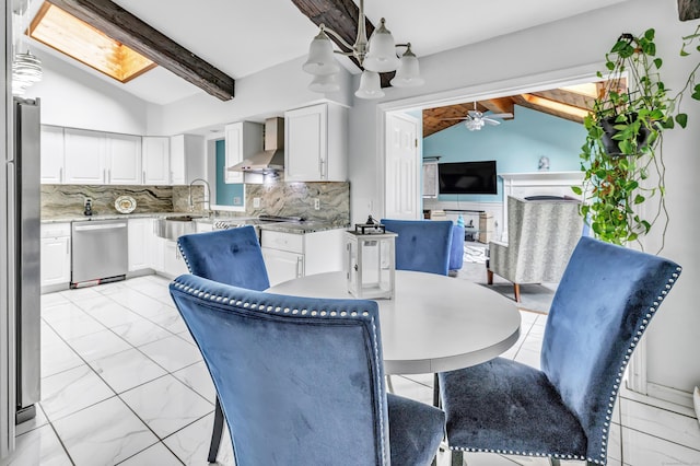 575 W Todd St, Hamden, CT 06518 - dining area with light marble finish floors and ceiling fan