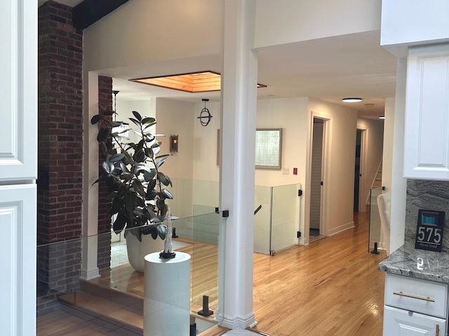 575 W Todd St, Hamden, CT 06518 - hallway with light wood-style flooring and stairway