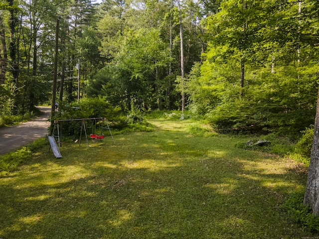 28 Oak Dr, Woodstock, CT 06282 - view of grassy yard featuring a wooded view