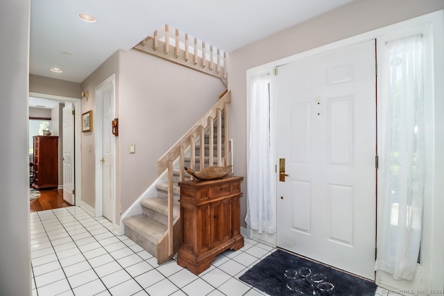 230 New Canaan Ave Apt 2, Norwalk, CT 06850 - foyer entrance with light tile patterned flooring, stairway, recessed lighting, and baseboards