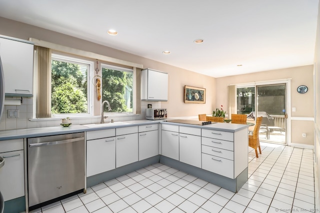 230 New Canaan Ave Apt 2, Norwalk, CT 06850 - kitchen featuring stainless steel dishwasher, a sink, a peninsula, white cabinets, and light countertops