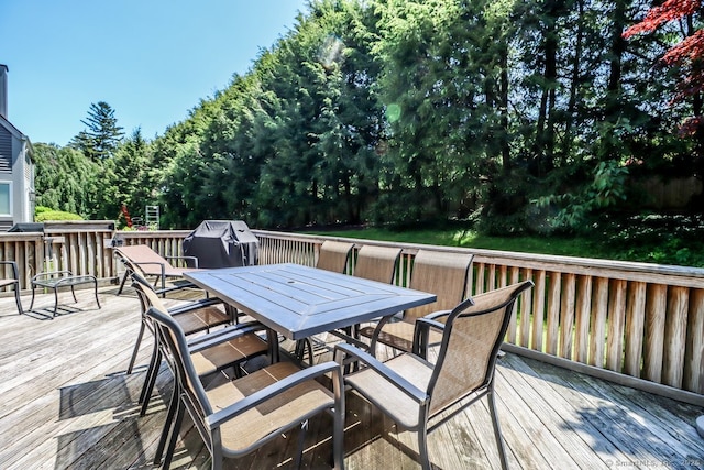 230 New Canaan Ave Apt 2, Norwalk, CT 06850 - deck featuring outdoor dining area, a grill, and view of wooded area
