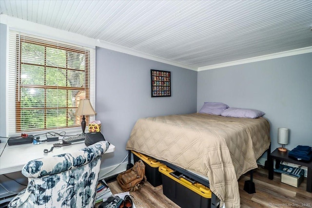 206 Litchfield Tpke, Washington, CT 06777 - bedroom with multiple windows, wood finished floors, and crown molding