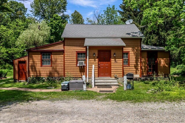 206 Litchfield Tpke, Washington, CT 06777 - view of front of home with roof with shingles and cooling unit