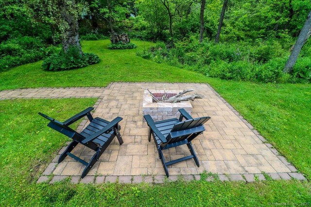 206 Litchfield Tpke, Washington, CT 06777 - view of patio with a fire pit