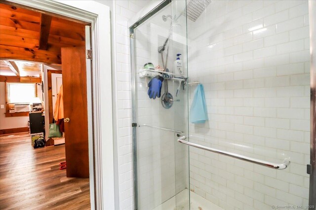 206 Litchfield Tpke, Washington, CT 06777 - bathroom featuring wood finished floors and a shower stall