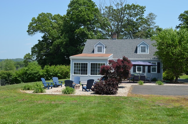 55 Cloudland Rd, North Haven, CT 06473 - rear view of property with a yard, a chimney, a patio, and a fire pit