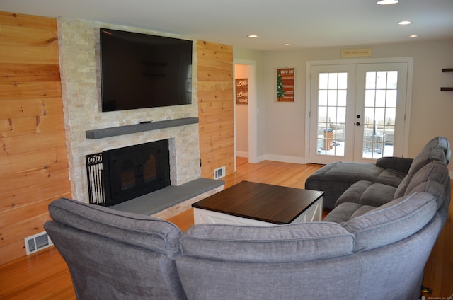 55 Cloudland Rd, North Haven, CT 06473 - living room with wood finished floors, french doors, recessed lighting, and a fireplace